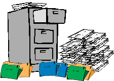 Files and folders piled up around filing cabinet