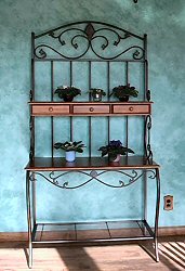 Baker's rack on faux finish wall
