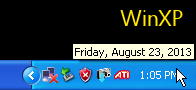 Tooltip for the clock shows the day and date (WinXP)
